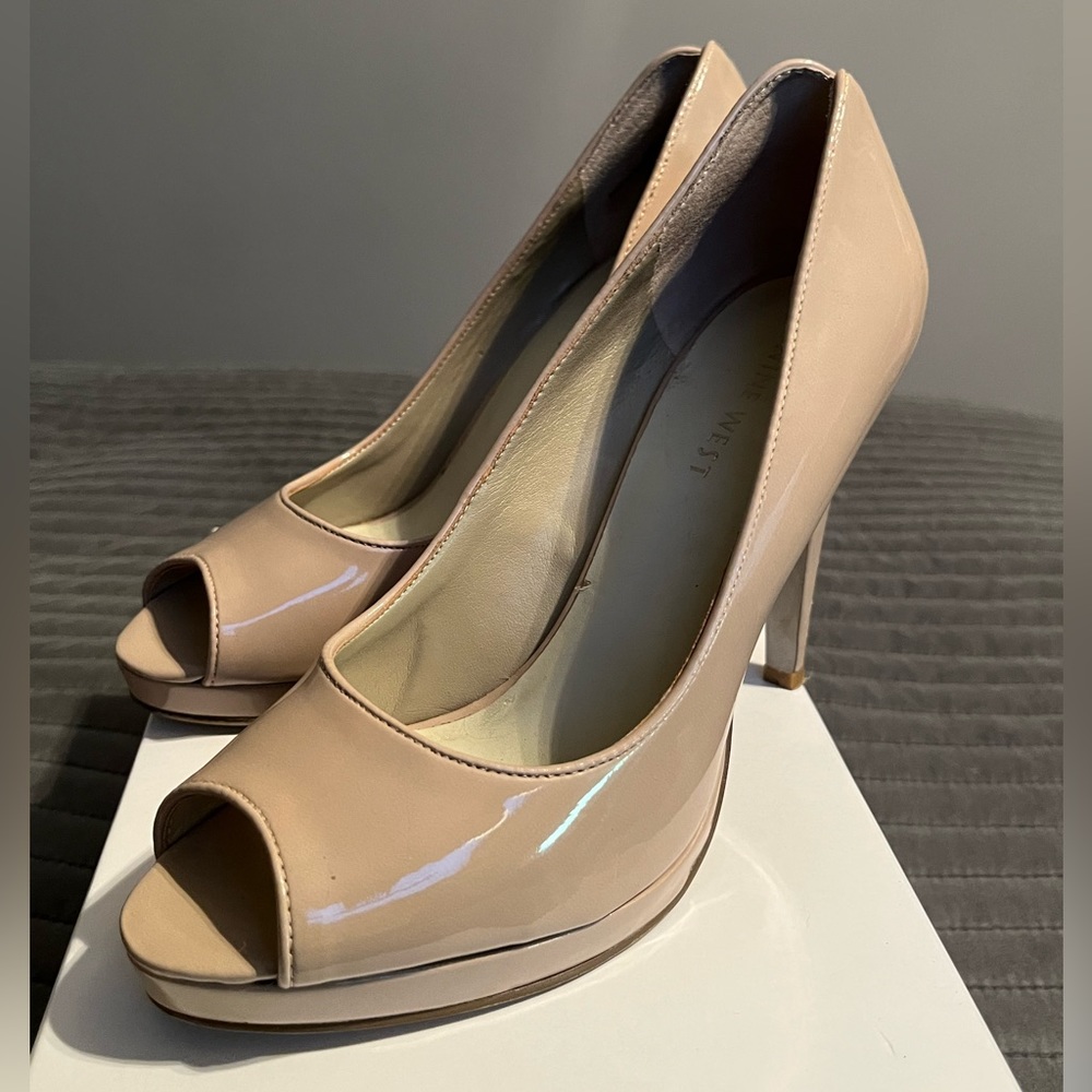 Nine West, size 7, open-toed pumps.